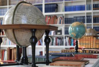Globe in Library About ILAB